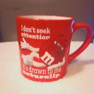 Red M&M 16oz Coffee Mug "I don't seek attention it's drawn to me naturally"
